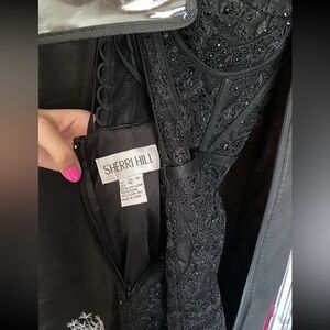 Worn once. Has detachable sleeves, Black, sparkly lace dress with a corset top.